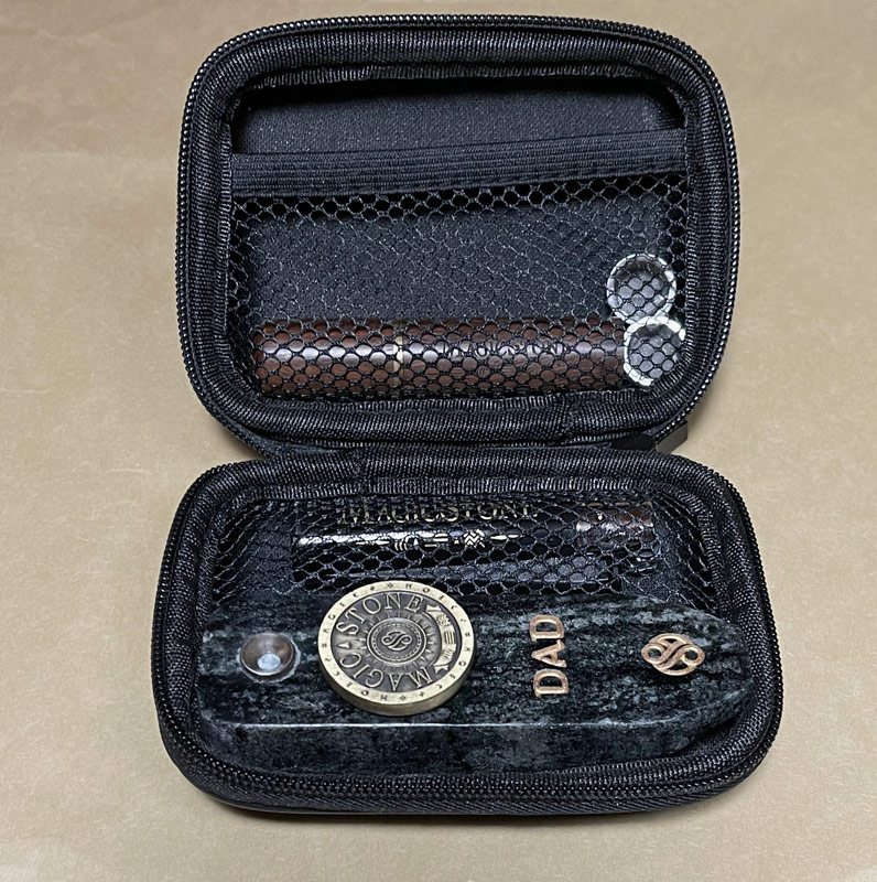 MagicStone Odyssey Kit packed with Odyssey heat-don't-burn cannabis device and essential accessories. Pick/stash case, extra basket screens and custom Clipper lighter