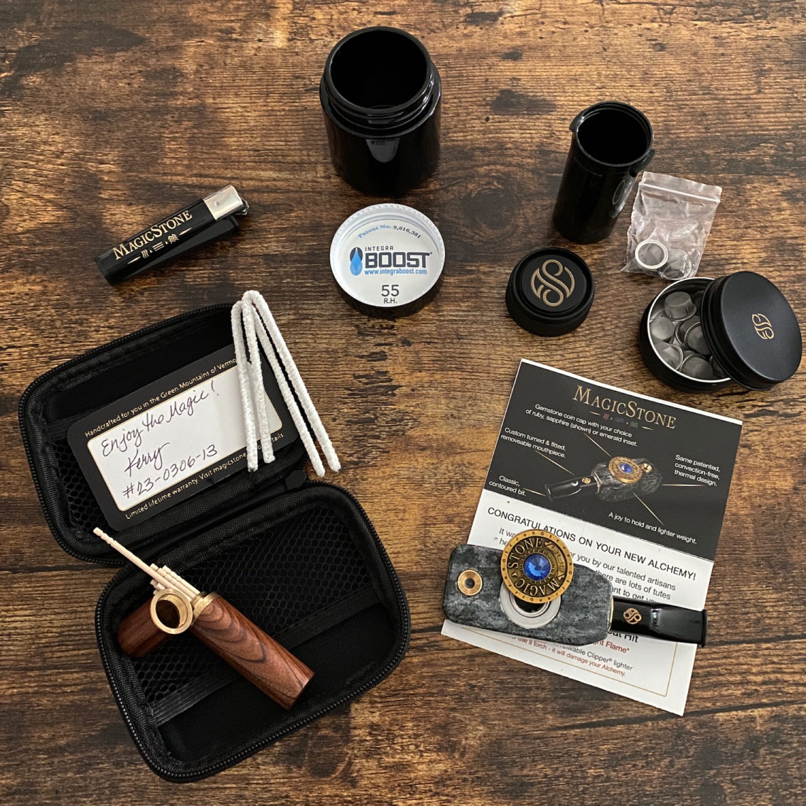 MagicStone Alchemy Elemental Kit packed with Alchemy heat-don't-burn cannabis device and essential accessories. Pick/stash case, extra basket screens and custom lighter